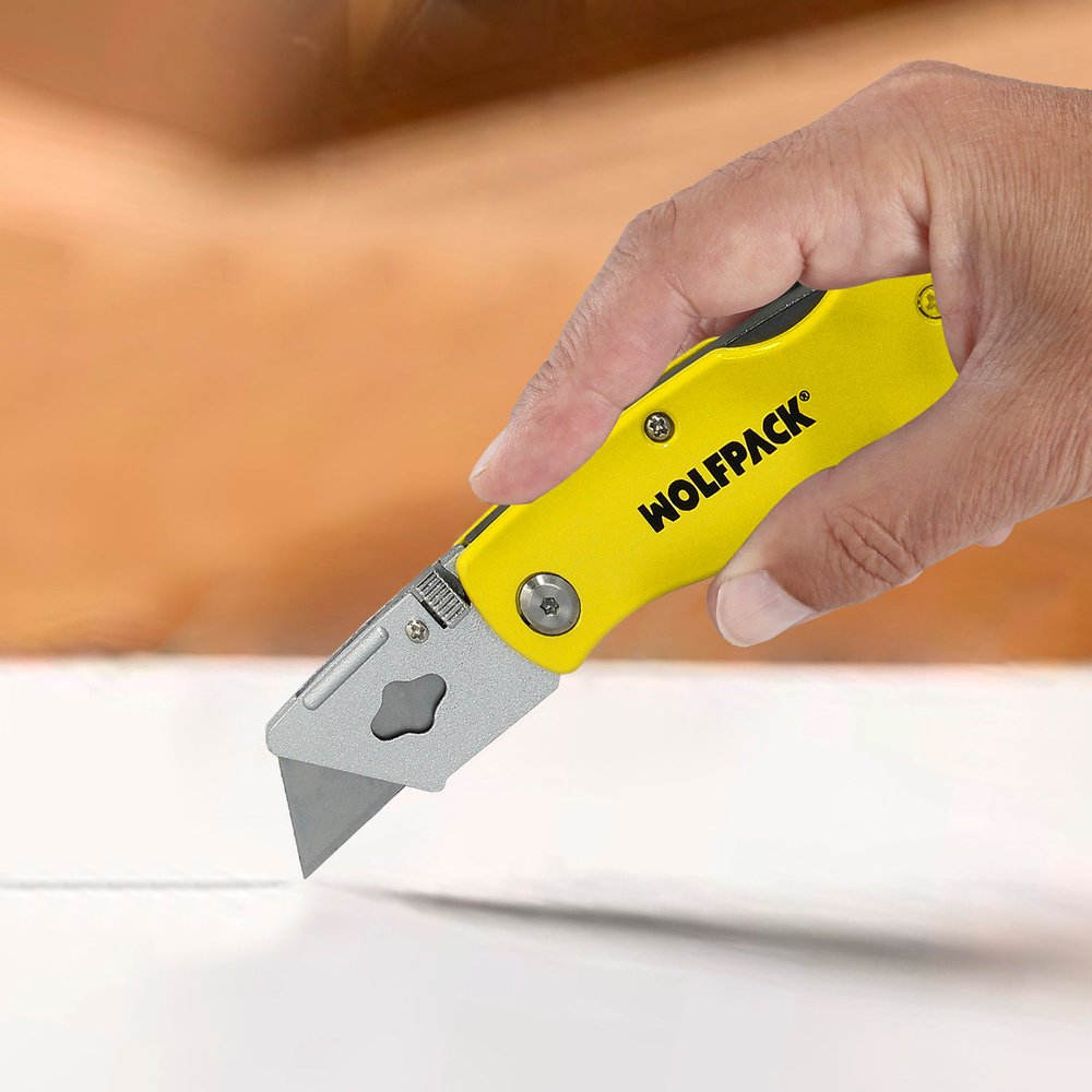 Cutter Plegable Hoja Trapezoidal 155 mm. 7 Cutter Plegable Hoja Trapezoidal 155 mm.